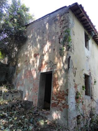 Complesso storico costituito dalla vecchia chiesa di S.Lorenzo Martire,  con annesso campanile e canonica in Fauglia slide